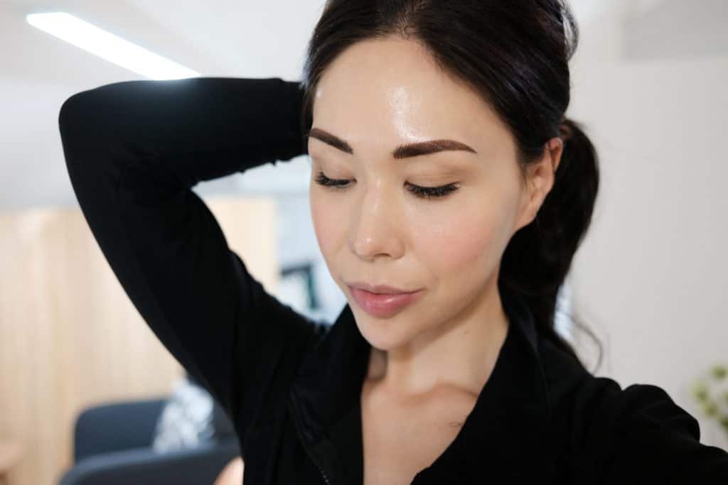 Freshly microbladed eyebrows and eyelash extensions in Seoul - close up with minimal face makeup